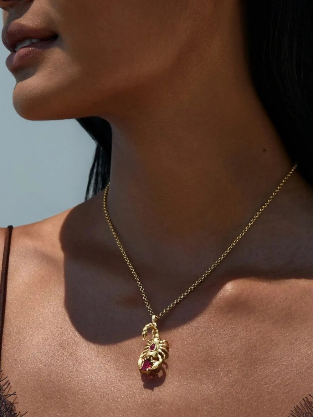 Awe Inspired Gold Scorpion Necklace With Garnet